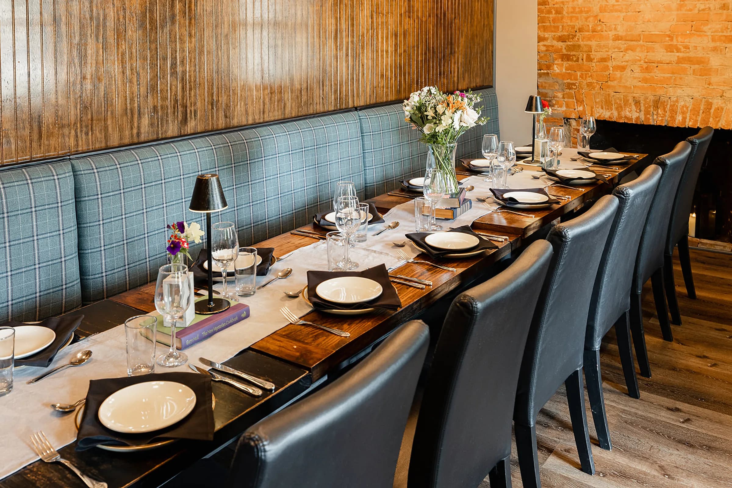 A long table set for a private dinner in one of the group's private dining rooms