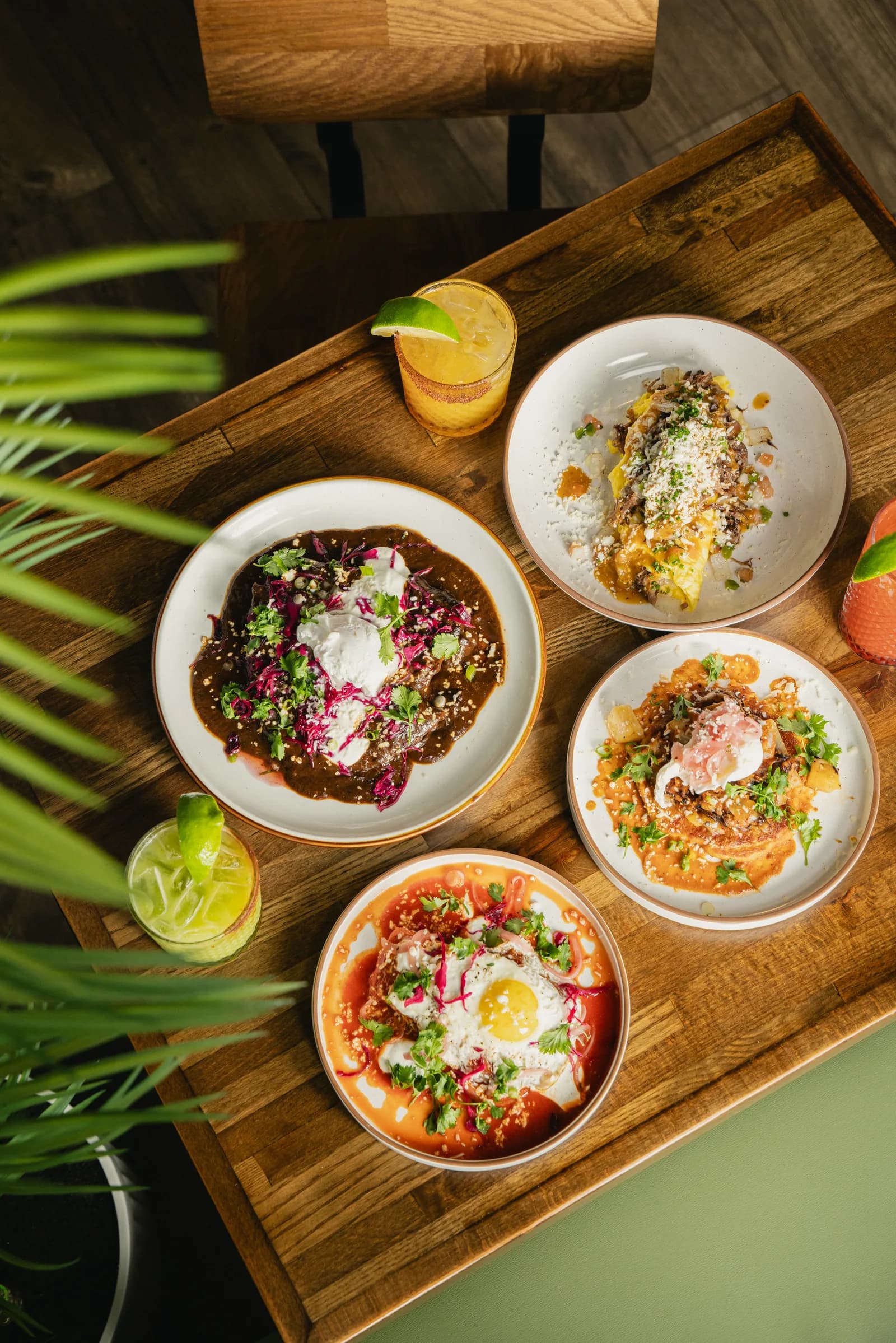 A tray of plates set down on the table at Crown Cantina