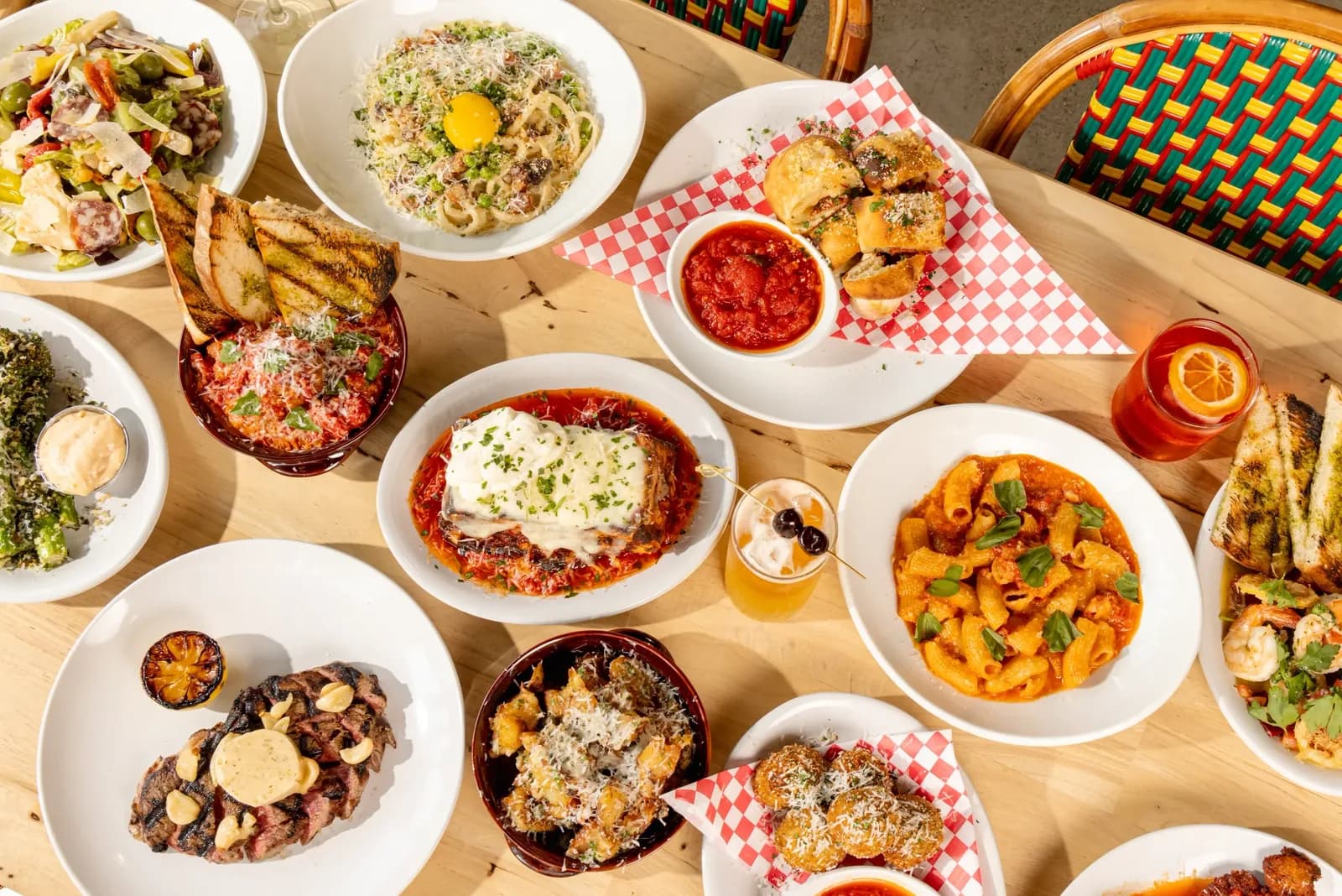 A table spread of pasta and antipasti at Rosie's Italian
